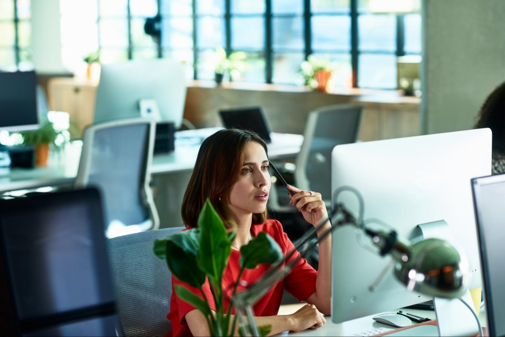 Workshop session with playwrights reviewing scripts and discussing character development techniques