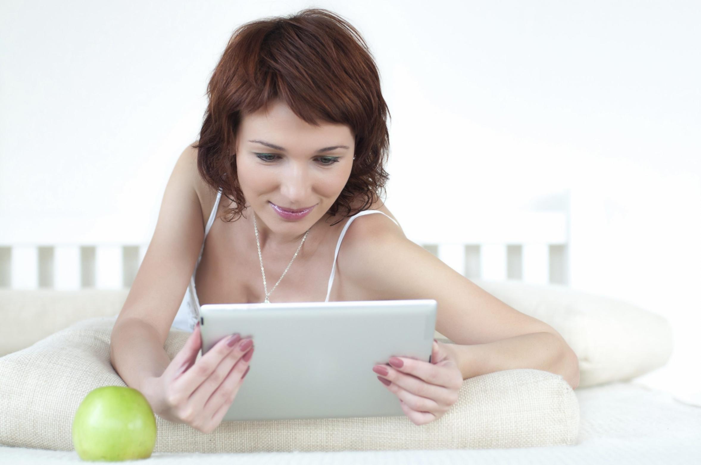 Playwright working on manuscript with coffee and notes