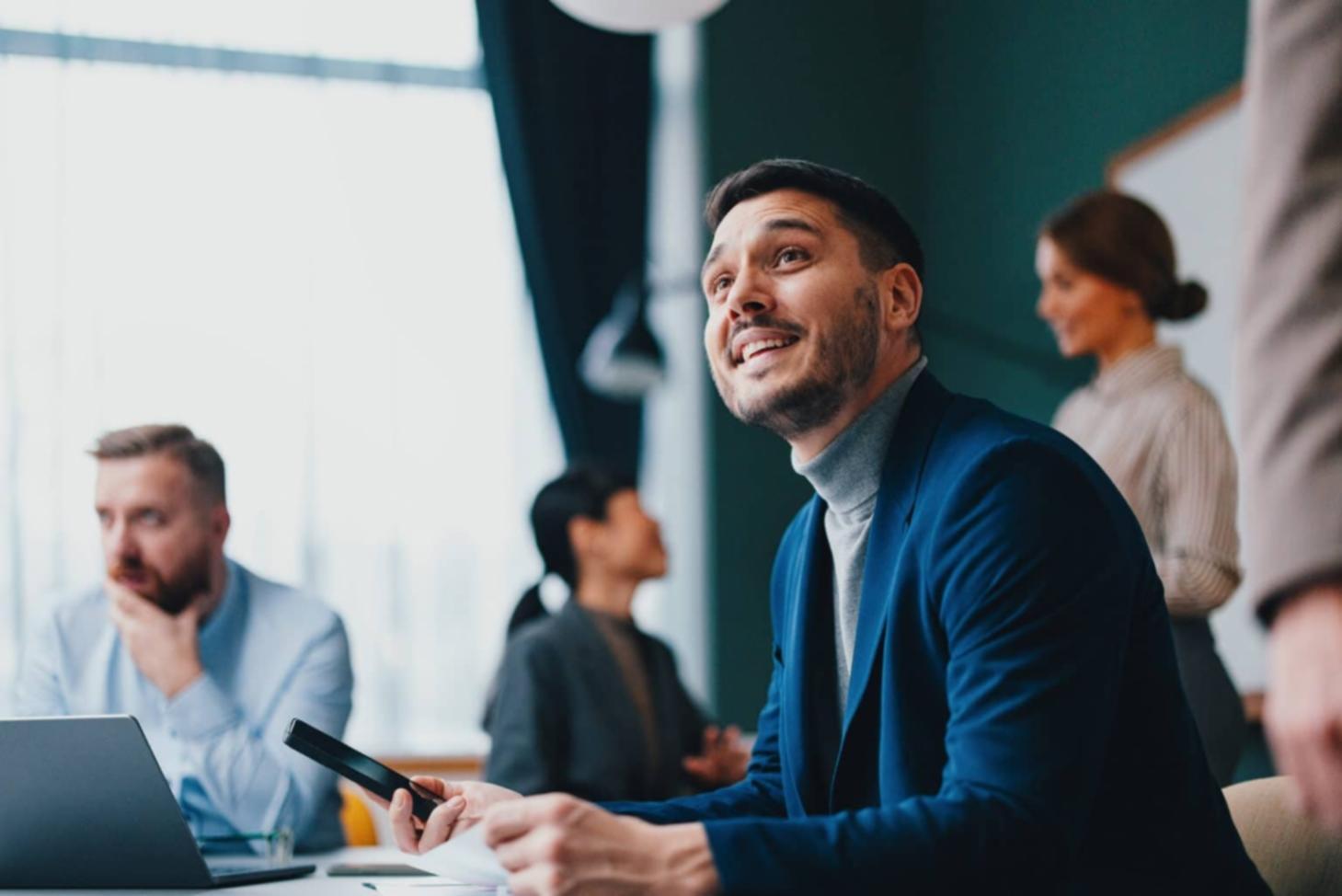 Close-up of handwritten script pages with red editing marks